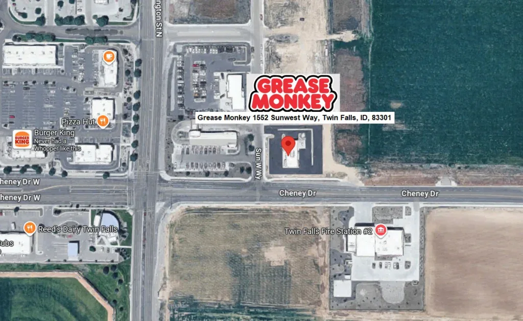 Aerial map view showing Grease Monkey oil change at 1652 Sunwest Way, Twin Falls Idaho, near Cheney Dr and Washburn Ave, with nearby businesses and fields—your local stop for expert engine protection.