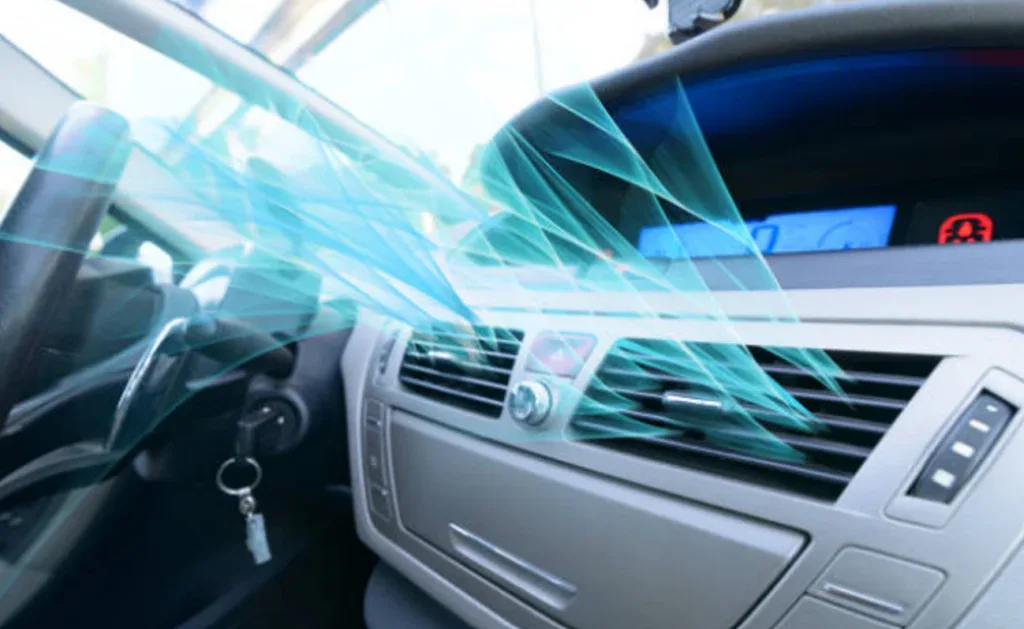 Close-up of a Chevy dashboard and air conditioning vent with blue animated lines showing cool air flow inside the vehicle—perfect for staying comfortable during those hot Magic Valley drives.