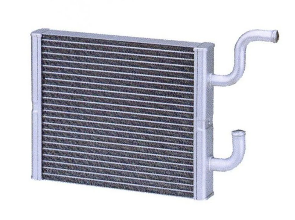 A metal automotive heater core for vehicle air conditioning, featuring multiple horizontal fins and two protruding pipe connectors on one side, pictured against a white background. Ideal for reliable air conditioning service in Rexburg Idaho.